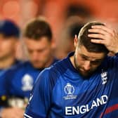 Defeated and dejected: Chris Woakes sums up the mood after England's opening night horror show in Ahmedabad. Photo by Gareth Copley/Getty Images.
