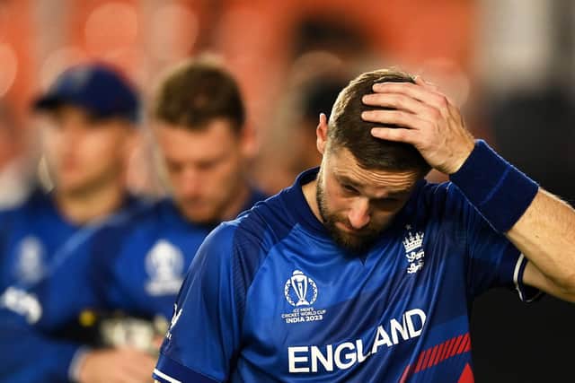 Defeated and dejected: Chris Woakes sums up the mood after England's opening night horror show in Ahmedabad. Photo by Gareth Copley/Getty Images.