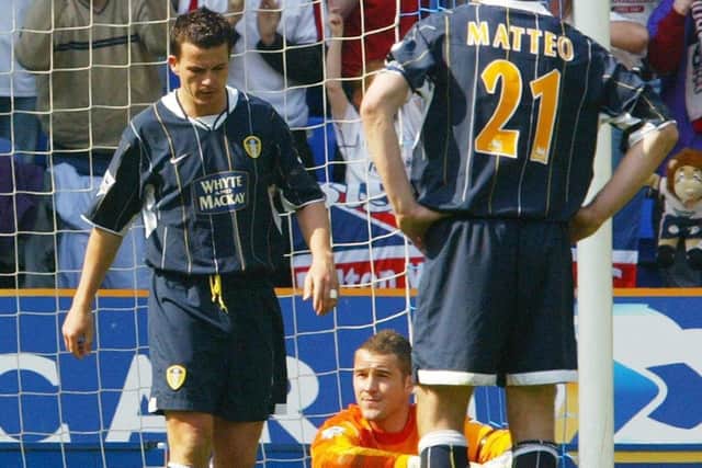LOW POINT: Leeds United players (from left-right) Ian Harte, Paul Robinson and Dominic Matteo show their dejection after Bolton Wanderers score a goal on the day the Whites were relegated with a 4-1 defeat