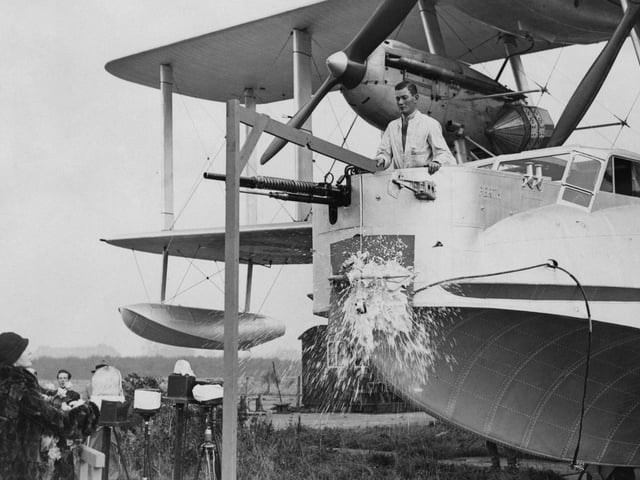 Lady Atkinson christened with champagne the Blackburn RB.3A Perth amphibious biplane reconnaissance aircraft seaplane of No. 209 Squadron RAF at Brough in October 1933 at Brough.