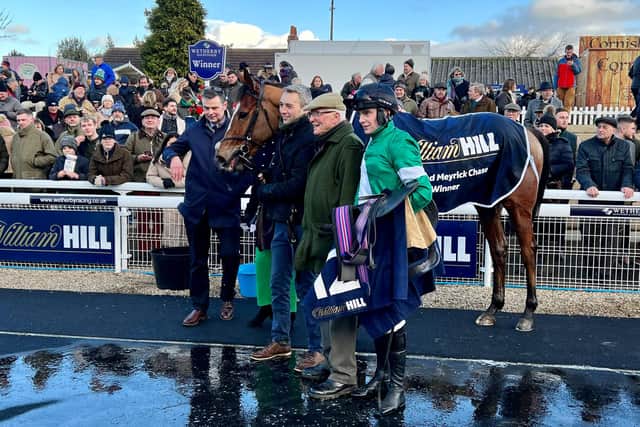 Into Overdrive winner of the Grade Three Rowland Meyrick Handicap Chase at Wetherby. Far left is owner/breeder Michael Hamilton and far right jockey and Hamilton’s son Jamie. (Picture: Richard Byram)