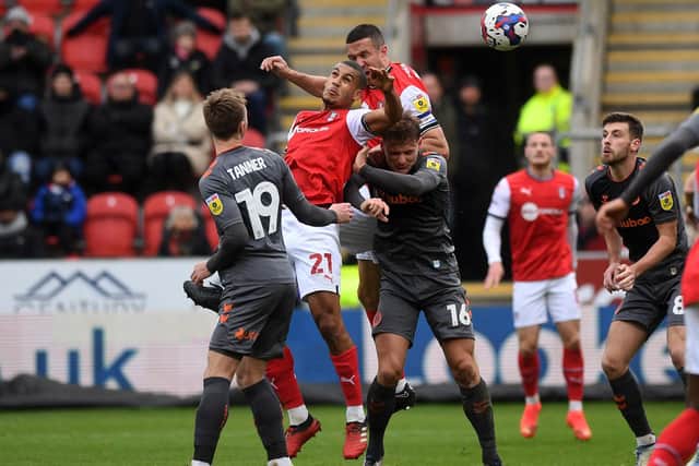 Richard Wood and Lee Peltier rise high on a difficult day for the Rotherham United duo against Bristol City. Picture: Jonathan Gawthorpe