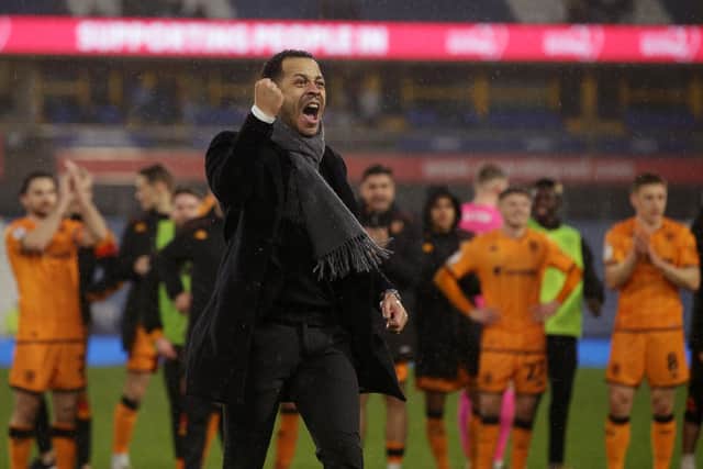 ECSTATIC: Hull City manager Liam Rosenior celebrates with the away fans