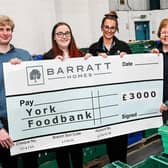 Local housebuilder donates £3,000 to York Foodbank. Adam Raffell, Lauren Grant, Danielle Tupman, Max