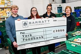 Local housebuilder donates £3,000 to York Foodbank. Adam Raffell, Lauren Grant, Danielle Tupman, Max