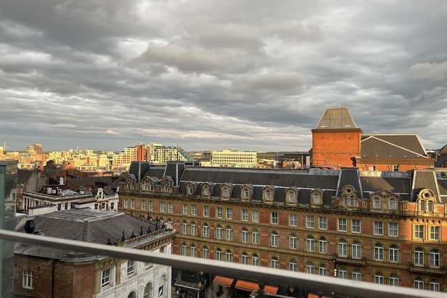 Panoramic view of Leeds at CrowdedHouse rooftop.