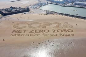 A giant sand artwork adorns New Brighton Beach to highlight global warming and the Cop26 global climate conference in 2021. PIC: Christopher Furlong/Getty Images