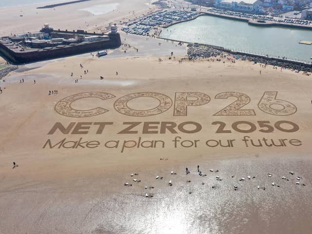 A giant sand artwork adorns New Brighton Beach to highlight global warming and the Cop26 global climate conference in 2021. PIC: Christopher Furlong/Getty Images