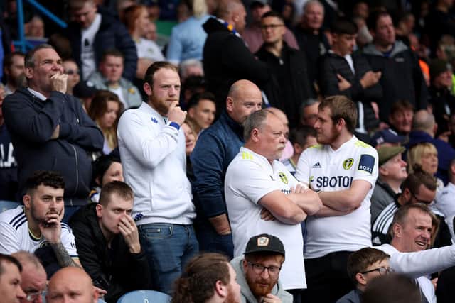 LEEDS, ENGLAND - OCTOBER 16: Leeds United fans look on as kick off is delayed due to a technical issue during the Premier League match between Leeds United and Arsenal FC at Elland Road on October 16, 2022 in Leeds, England. (Photo by Eddie Keogh/Getty Images)