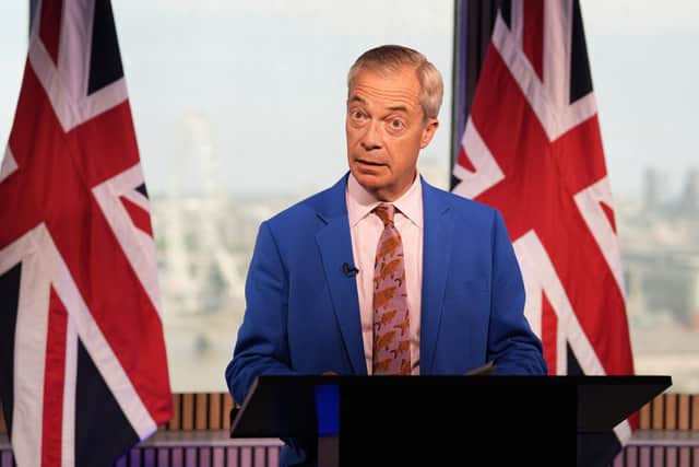 Reform UK leader Nigel Farage makes a statement to the media. PIC: Gareth Fuller/PA Wire