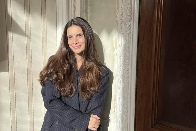 Laura Pitharas wears her own pinstripe wool double-breasted jacket, £795, and trousers, £575, at laurapitharas.com.