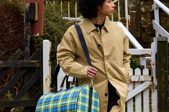Yorkshire Tartan Large Duffle Bag, £465. From tvfmr.com. Coat from Master Debonair in York. Picture by Victoria Bailey of Cedar Cottage Creative.