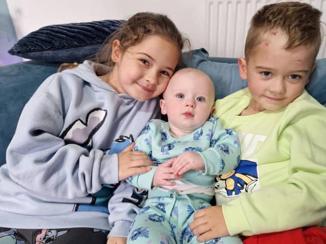 Marli with his sisters, eight-year-old Milli and 10-month-old Rayne