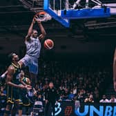 Sheffield Sharks' Malcolm Delpeche, pictured slamming home a dunk, is hoping for a reunion with his brother in the play-offs.