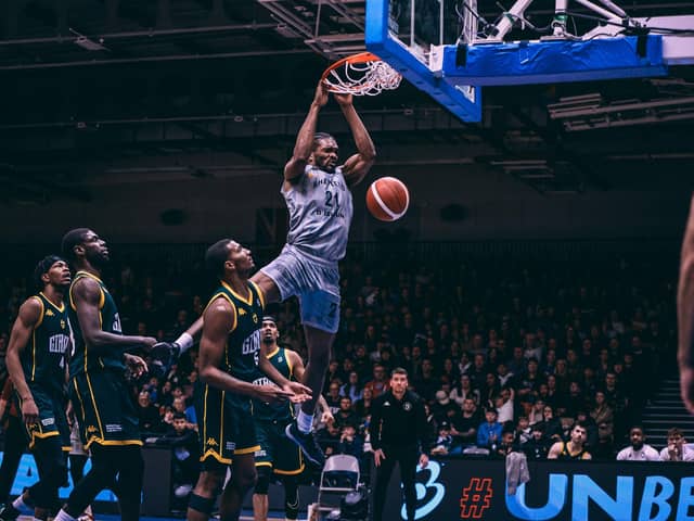 Sheffield Sharks' Malcolm Delpeche, pictured slamming home a dunk, is hoping for a reunion with his brother in the play-offs.