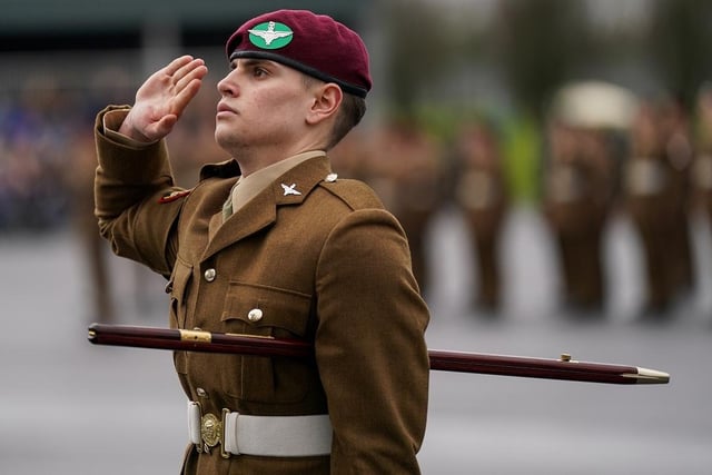 A junior soldier salutes.