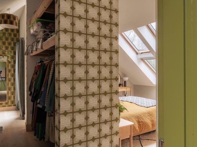 The dressing area in the principal bedroom offers dedicated space for storage and organisation.