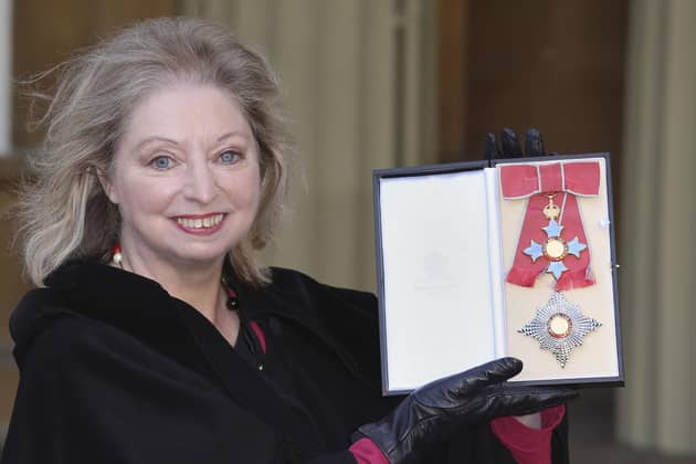 Dame Hilary Mantel holding her Dame Commander of the British Empire medal presented to her by the Prince of Wales for services to literature. PIC: Philip Toscano/PA Wire