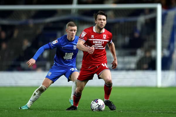 BIRMINGHAM, ENGLAND - MARCH 12: Jonathan Howson of Middlesbrough on the ball whilst under pressure from Jay Stansfield of Birmingham City during the Sky Bet Championship match between Birmingham City and Middlesbrough at St Andrews (stadium) on March 12, 2024 in Birmingham, England. (Photo by Catherine Ivill/Getty Images)