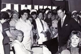 Prince Charles chats to patients and staff in the Sports Hall at Lodge Moor Hospital, Sheffield in June 1987.