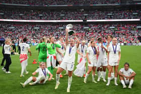 Beth Mead with the UEFA Women's EURO 2022 trophy at Wembley.