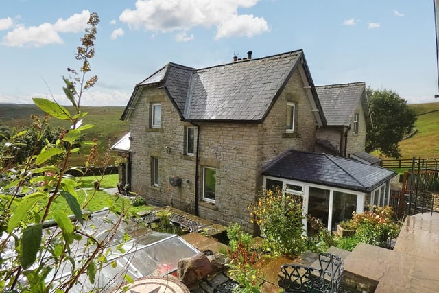 The semi-detached railway cottage is in a stunning location with long range rural views