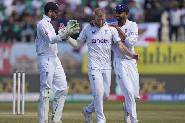 England captain Ben Stokes, centre, is congratulated by teammates Shoaib Bashir, right, and Ben Foakes after taking the wicket of India captain Rohit Sharma. Photo AP/Ashwini Bhatia.