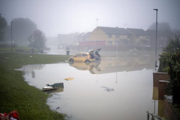 Flood waters begin to recede in the village of Catcliffe after Storm Babet flooded homes, business and roads on October 23, 2023 in Rotherham. (Photo by Christopher Furlong/Getty Images)