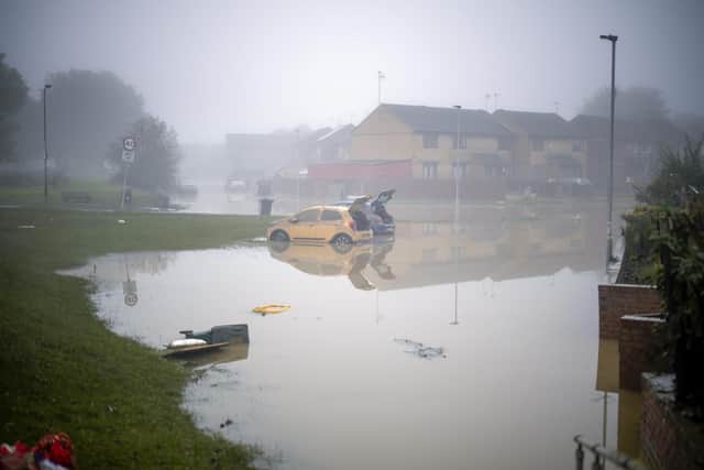 Flood waters begin to recede in the village of Catcliffe after Storm Babet flooded homes, business and roads on October 23, 2023 in Rotherham. (Photo by Christopher Furlong/Getty Images)