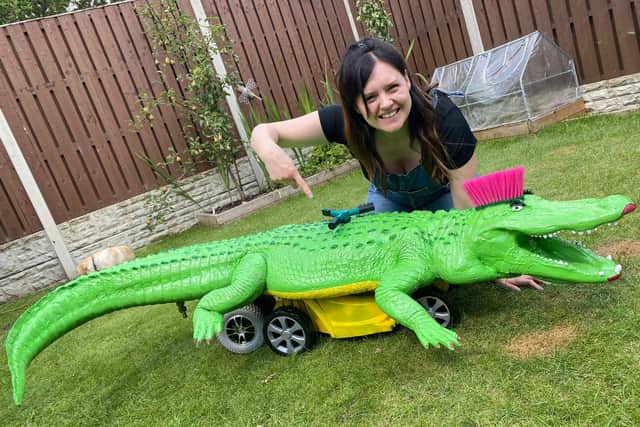 Ruth with the crocodile lawnmower made for the Kids Invent Stuff channel