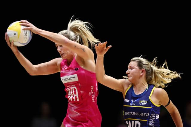 Rosie Harris of Leeds Rhinos, right, playing against London Pulse in the 2023 Netball Super League (Picture: Naomi Baker/Getty Images for England Netball)