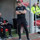 OPTIONS: Rotherham United caretaker manager Wayne Carlisle (centre) could have some key players back as he fills in after the sacking of Matt Taylor (right)