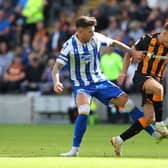 Back in August: Regan Slater of Hull City is challenged by Josh Windass of Sheffield Wednesday during the Sky Bet Championship match at the start of the season (Picture: Ashley Allen/Getty Images)