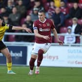 Latest Rotherham United signing Joe Powell, pictured in action for Burton Albion last November as Northampton Town rival Aaron McGowan watches on. Photo by Pete Norton/Getty Images.