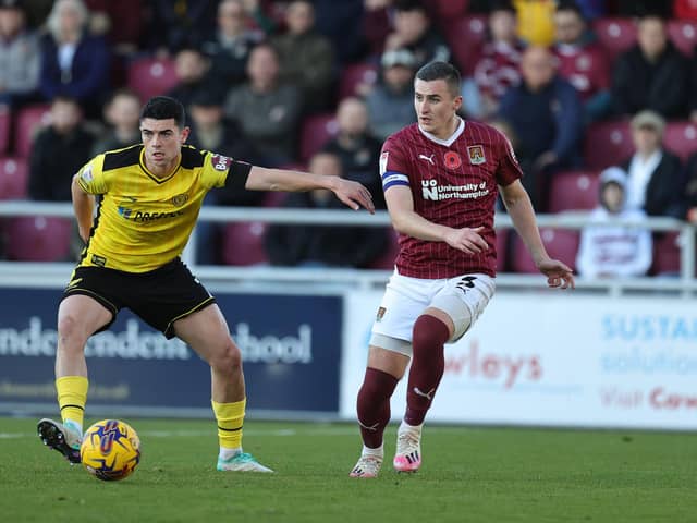 Latest Rotherham United signing Joe Powell, pictured in action for Burton Albion last November as Northampton Town rival Aaron McGowan watches on. Photo by Pete Norton/Getty Images.