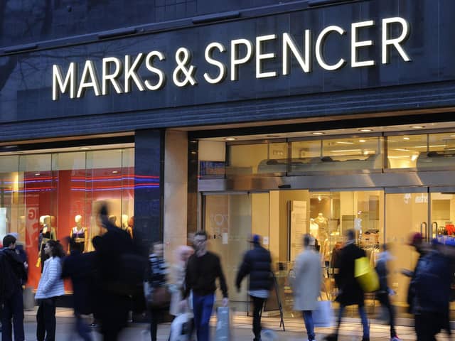 Marks & Spencer has revealed a jump in sales in the face of pressure on customer finances but saw profits dip over the past year on the back of higher costs.