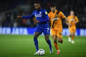 CARDIFF, WALES - NOVEMBER 24: Leandro Bacuna of Cardiff City is tackled by Ryan Longman of Hull City during the Sky Bet Championship match between Cardiff City and Hull City at the Cardiff City Stadium on November 24, 2021 in Cardiff, Wales. (Photo by Harry Trump/Getty Images)