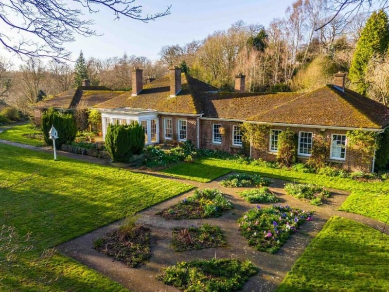 The house is single storey with wings either side