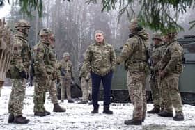 Labour leader Sir Keir Starmer (centre) during his visit to meet British troops at Tapa forward operating Nato base, near the Russian border in Estonia. PIC: Stefan Rousseau/PA Wire