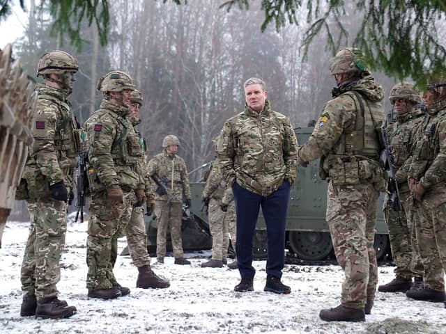 Labour leader Sir Keir Starmer (centre) during his visit to meet British troops at Tapa forward operating Nato base, near the Russian border in Estonia. PIC: Stefan Rousseau/PA Wire