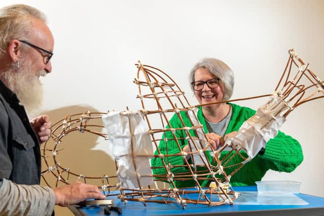 Alan Scully and Frances Noon making a lantern for the 2023 Moonraking festival. Picture: Bruce Rollinson.