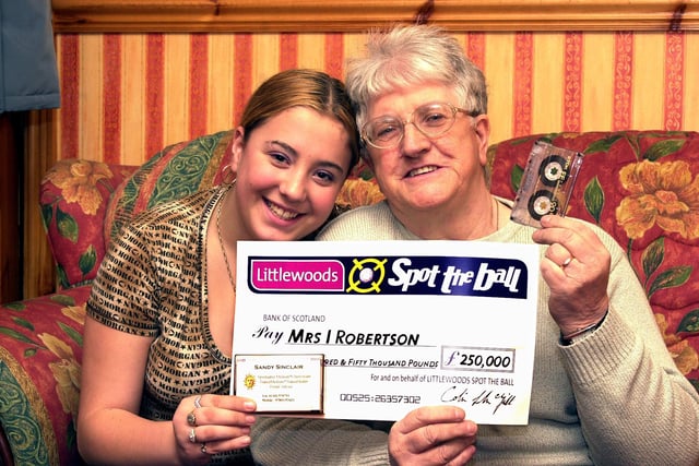 Conisbrough gran Irene Robertson is pictured with granddaughter Debbie Smith, aged 15, and a  £250,000 cheque in 2004