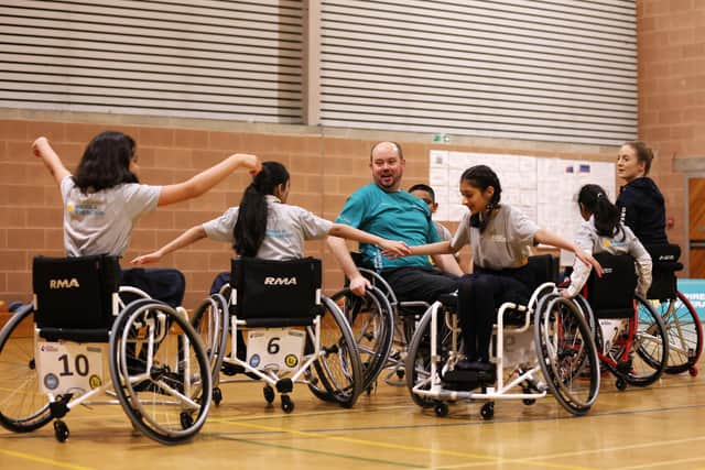 Pupils at Bradford Girls Grammar School take part in an Inspire a Generation wheelchair basketball session.