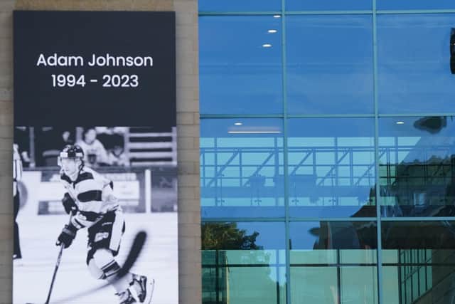 A message board with a tribute to Nottingham Panthers' ice hockey player Adam Johnson outside the Motorpoint Arena in Nottingham, the home of the Panthers. Photo credit Jacob King/PA Wire.