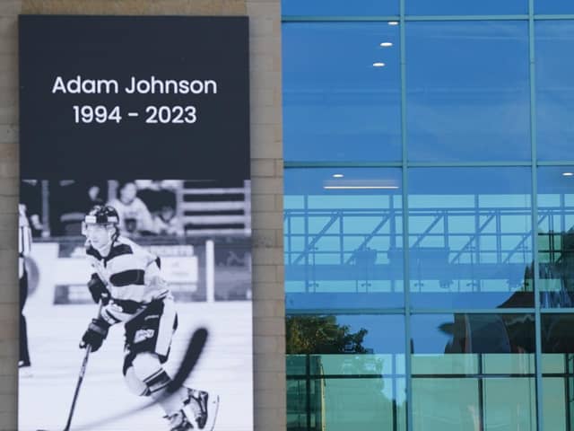 A message board with a tribute to Nottingham Panthers' ice hockey player Adam Johnson outside the Motorpoint Arena in Nottingham, the home of the Panthers. Photo credit Jacob King/PA Wire.