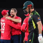 England's Chris Woakes (C) celebrates with team-mates after dismissing Australias Mitchell Marsh during the third and final match of the T20 series in Canberra. Picture: DAVID GRAY/AFP via Getty Images