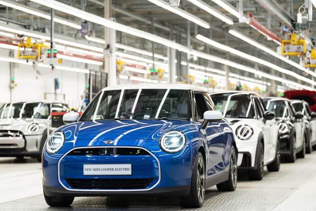 Library image of the new Mini Cooper Electric on the production line at the BMW Mini plant at Cowley in Oxford.  ( Photo by Joe Giddens/PA Wire)