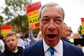 Nigel Farage speaks with protesters outside Downing Street in central London, on the first day of the expansion of the ultra-low emission zone (Ulez) to include the whole of London. Picture: Victoria Jones/PA Wire