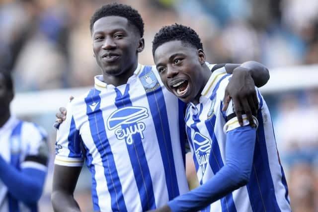 Anthony Musaba (right) celebrates with Sheffield Wednesday team-mate Di'Shon Bernard during the Owls' recent victory over Rotherham United. Picture: Steve Ellis.