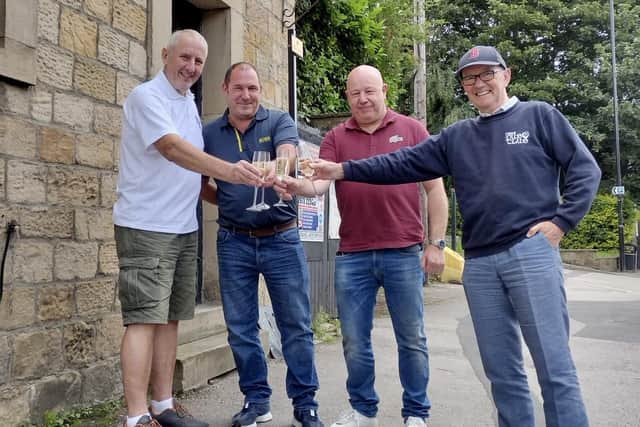 The Cross Pipes' new owners celebrate